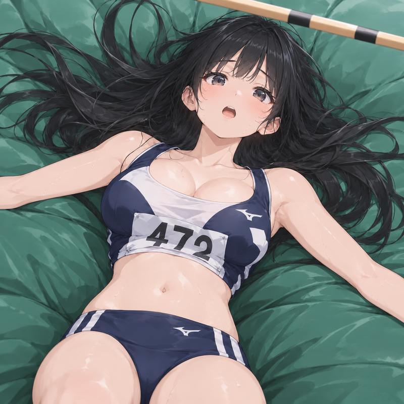走り高跳びでバーが落ちてないことに安堵する女の子